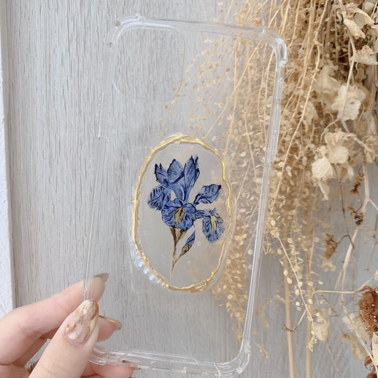 「blue flower」という商品の写真。透明なケースの中央に青い花が書かれている。