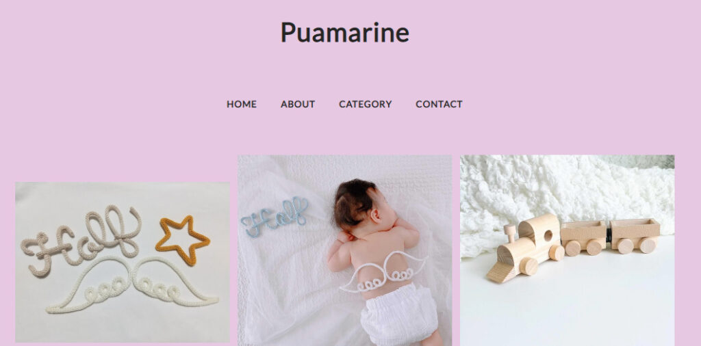 Puamarineのトップ画像。
ピンクのバッグにショップ名と下に商品が3つ並んでいる。
