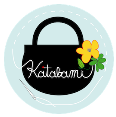 堀田真由美さんのショップKatabamiのトップ画像、水色の円形の中に黒いバッグ、ロゴが描かれている