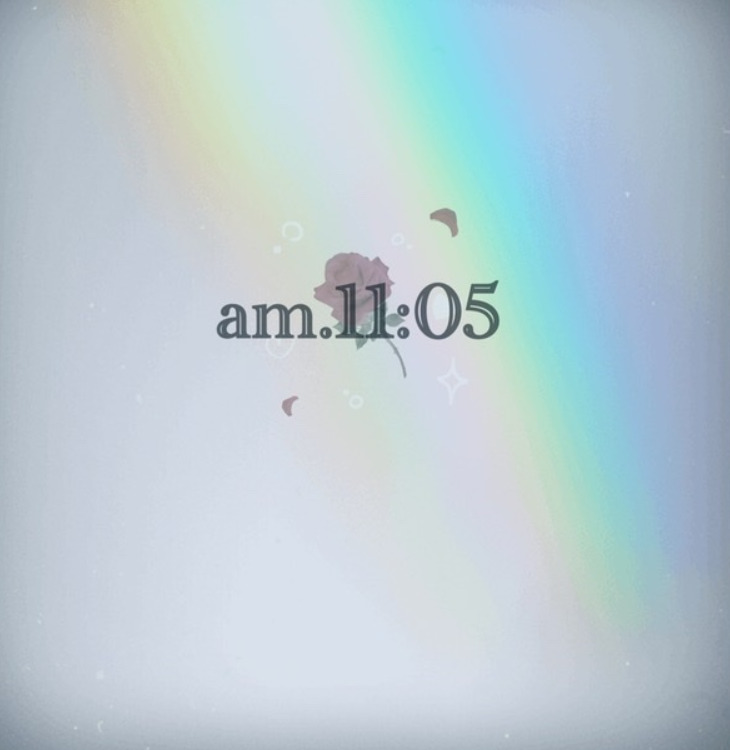 蔵津麗花さんのショップam.11:05のトップ画像、虹とバラの写真の上にショップロゴが書かれている