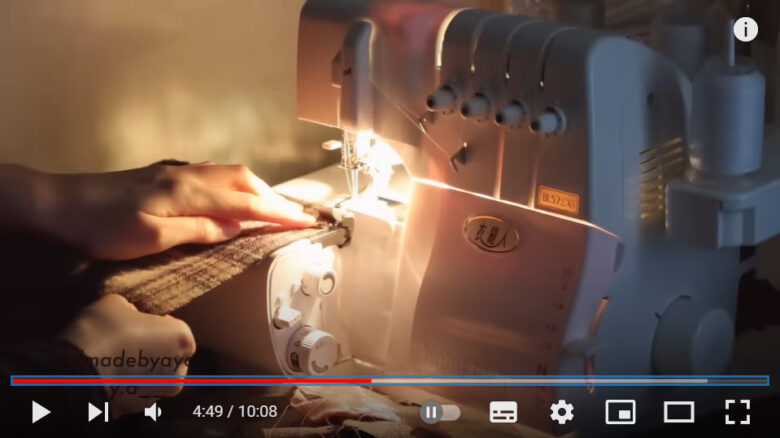 動画の見どころを説明する際の画像。
ミシンでスカートを縫う作業工程が写っている。